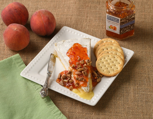 BAKED BRIE WITH MAPLE PECAN CRUMBLES AND PEACH PEPPER JELLY