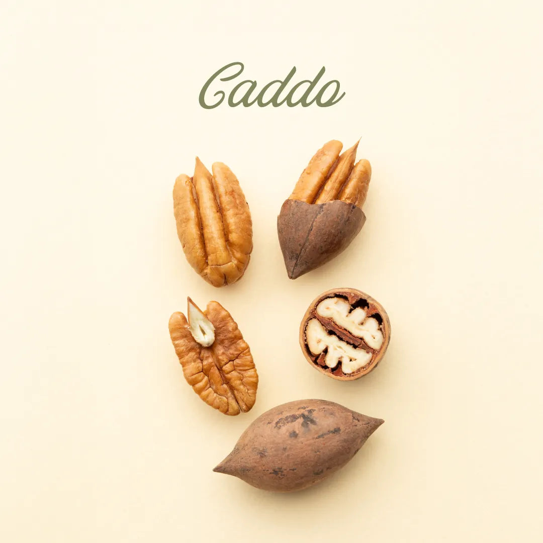Pecans on a beige background with 'Caddo' branding.