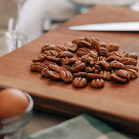Pecans on a chopping board